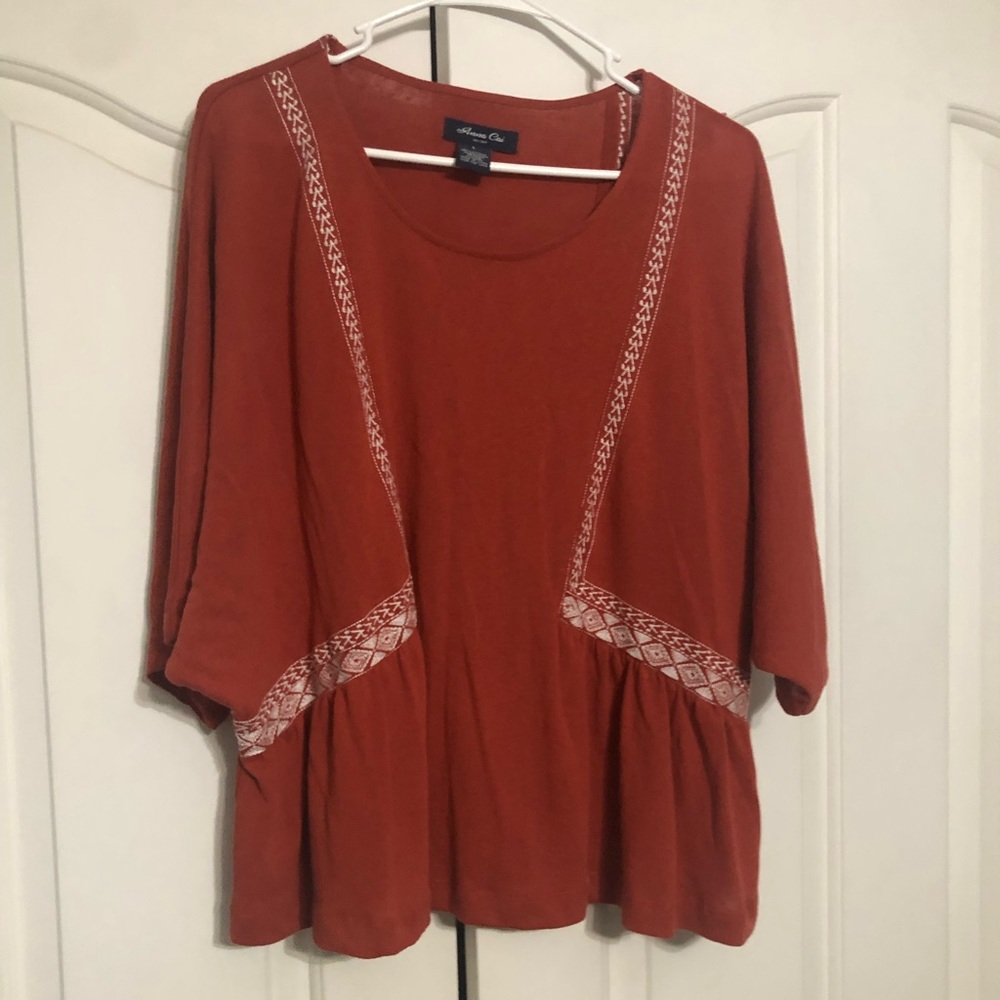 Rust colored shirt!